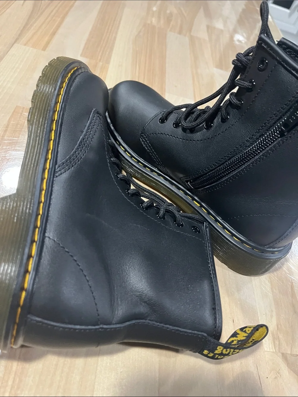Dr. Martens Black Leather Lace-Up Boots with Yellow Stitching